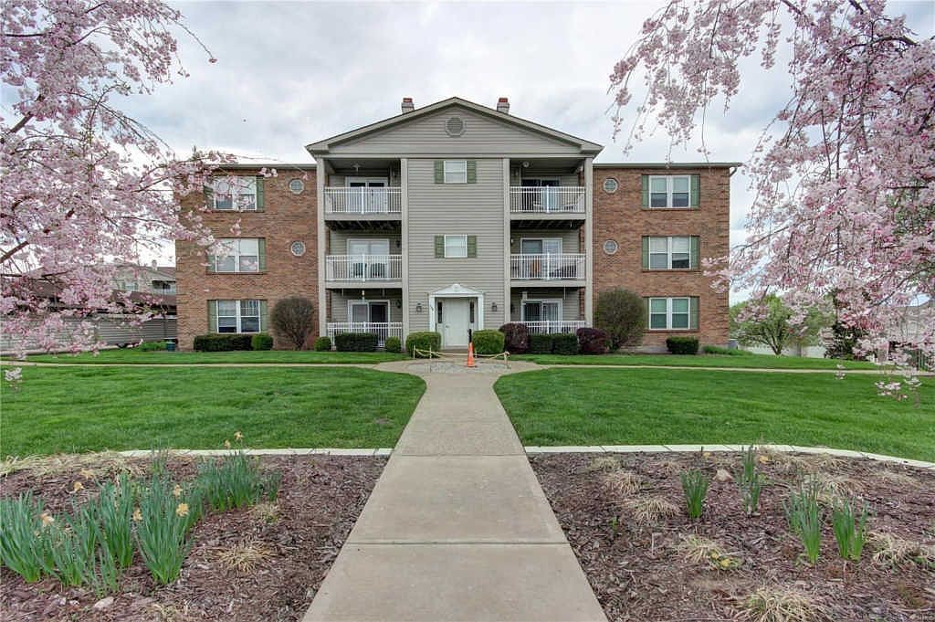 Building front and courtyard walkway in spring